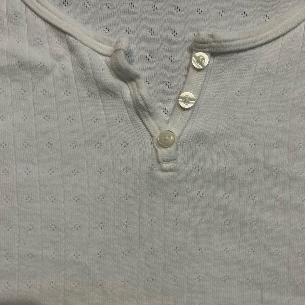 White baby tee with buttons from brandy Melville ( one size )